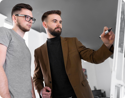 executive coach guiding professional client through leadership planning session