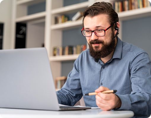 online tutor teaching from laptop with virtual class setup