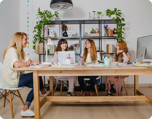 small tutoring studio with multiple students and instructor working together
