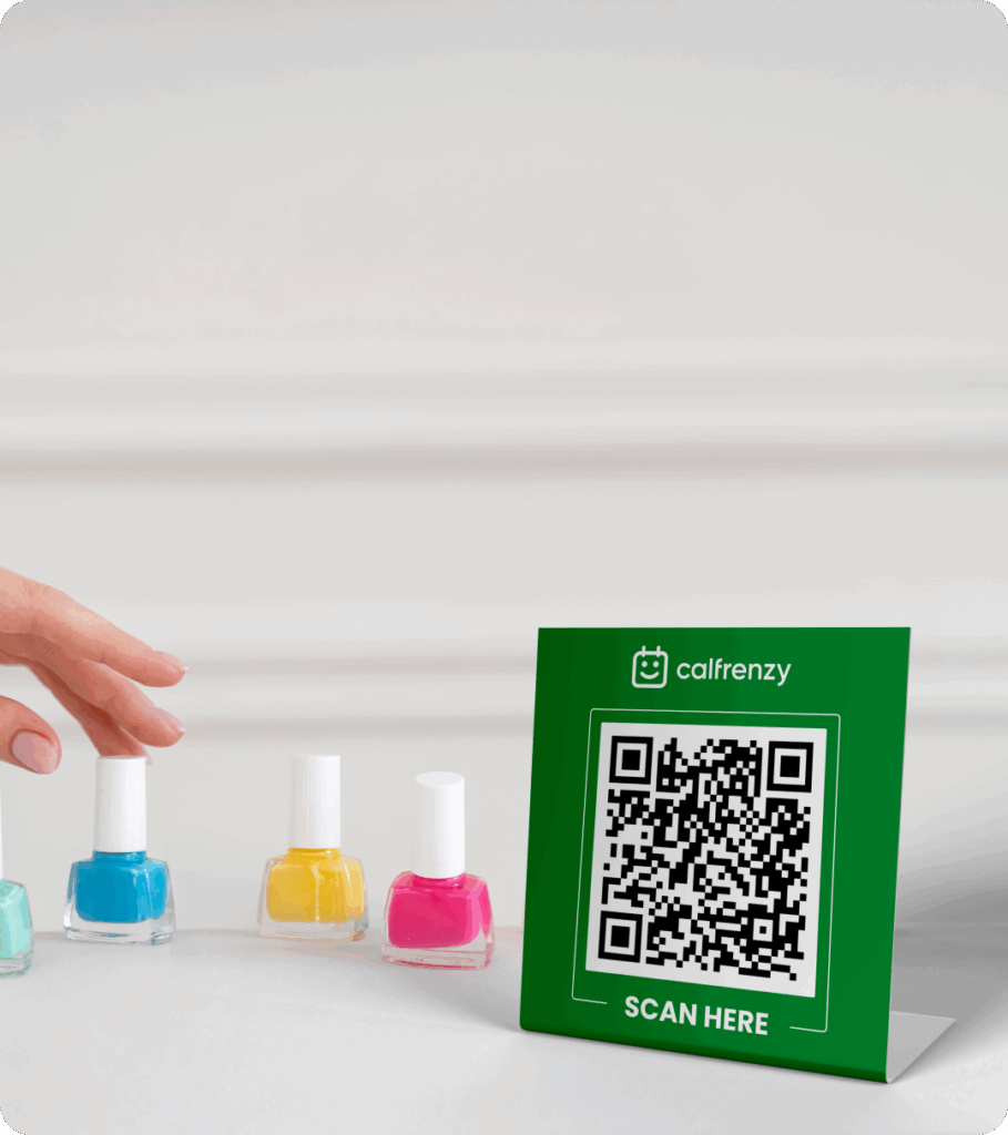 QR code booking card displayed beside nail polish bottles.