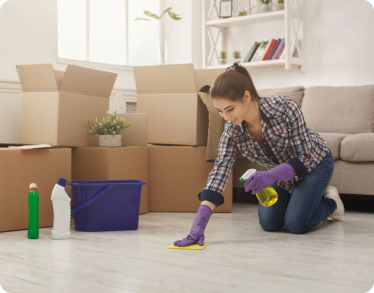 Cleaner preparing a home for move-in or move-out deep cleaning.