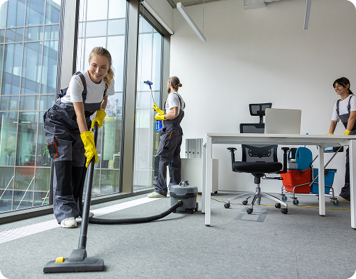 Commercial cleaning team working in an office environment.
