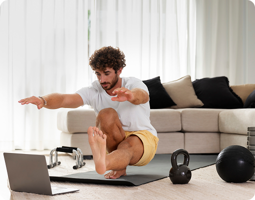 Online personal training session via laptop at home.